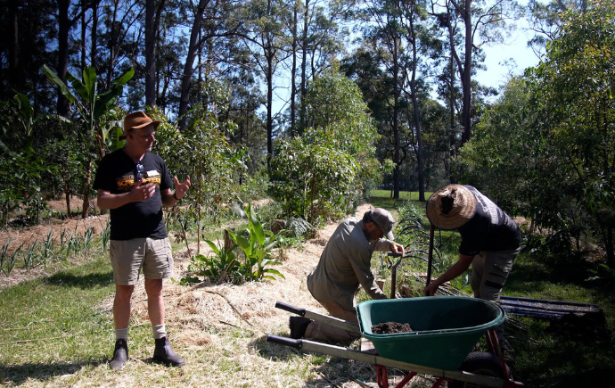 Photo of community members preparing a garden plot at Chaffin Creek Farm